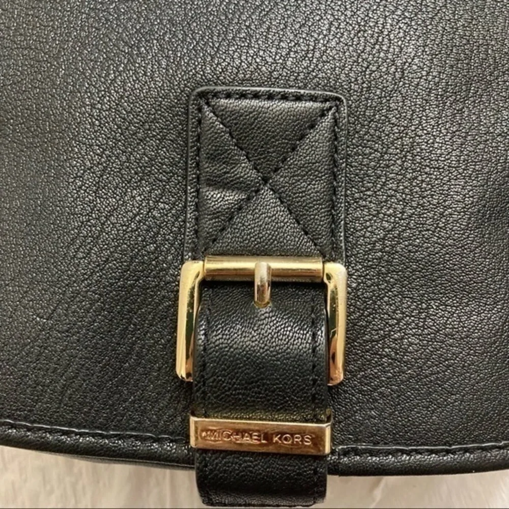 Michael kors black leather buckled saddle flap bag